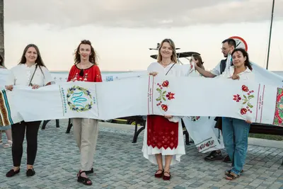Embroidered panels of the rushnyk held along the Larnaca promenade